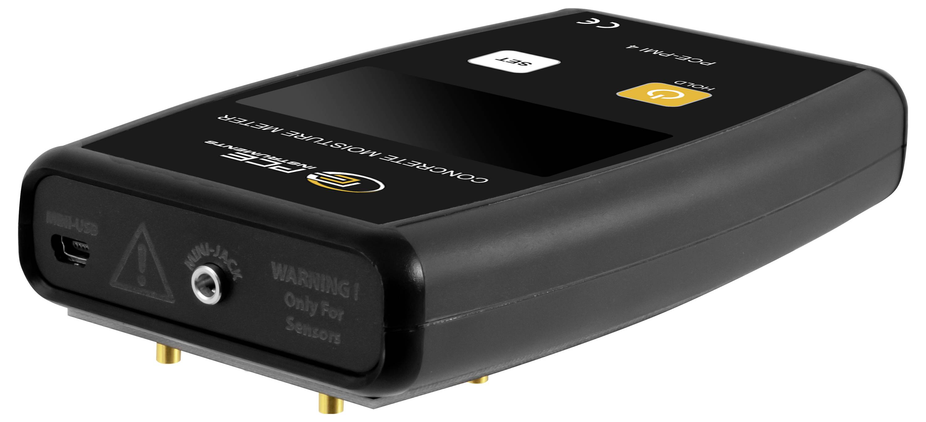 Zwart elektronisch sensormodule met USB-poort, coaxiale connector en waarschuwingslabel, weergegeven in driekwartaanzicht op een witte achtergrond.