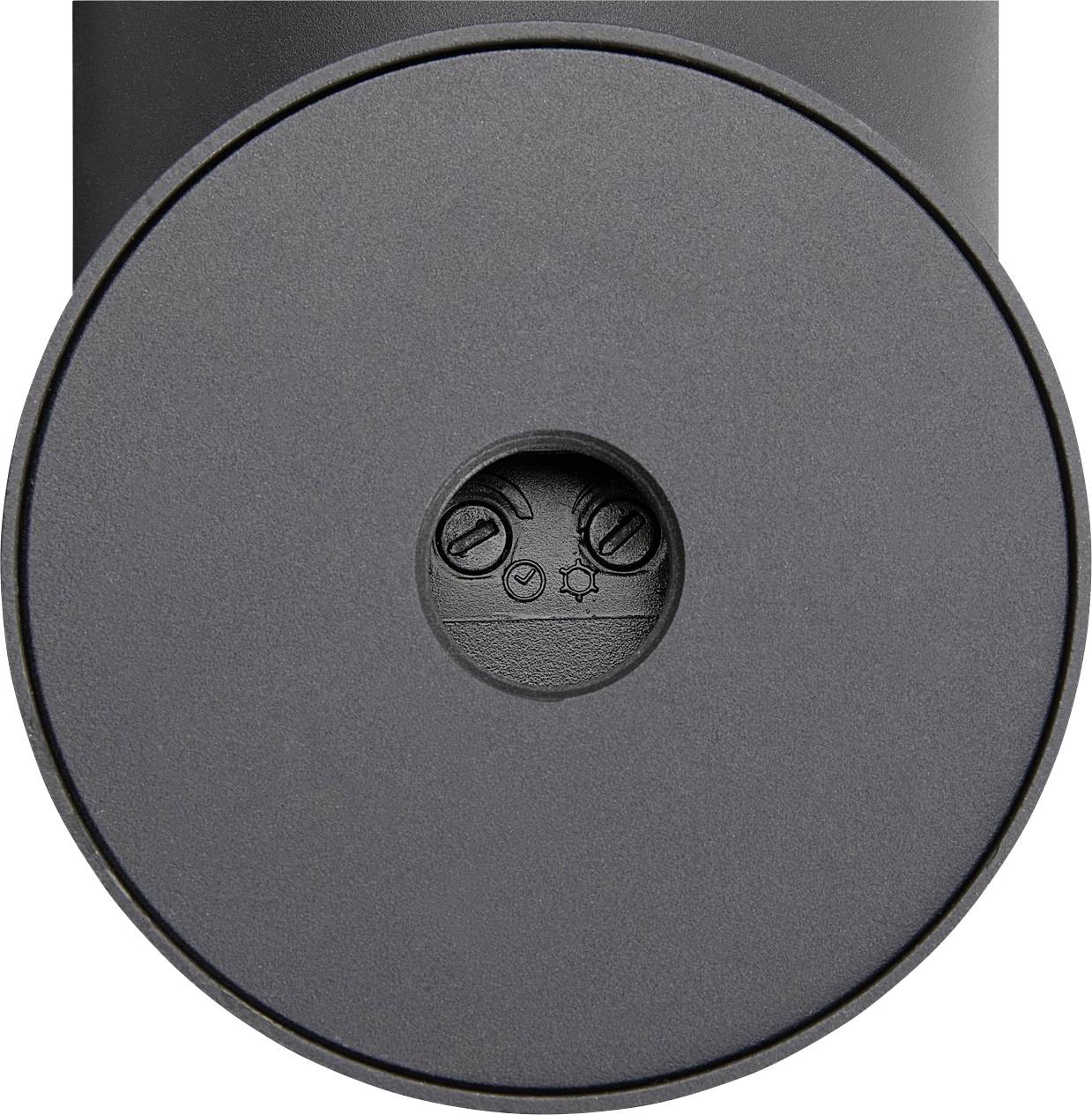 Zwarte ronde luidspreker met minimalistisch design en een centraal bedieningspaneel met symbolen voor volume, afspelen en instellingen.