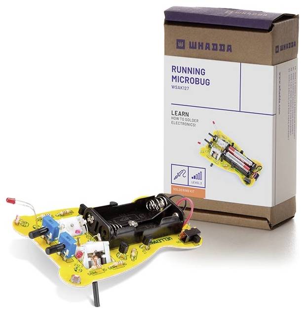 Bouwpakket voor een 'Running Microbug' robot met batterijvak en sensoren. Verpakking toont montagehandleiding voor elektronisch soldeerproject.