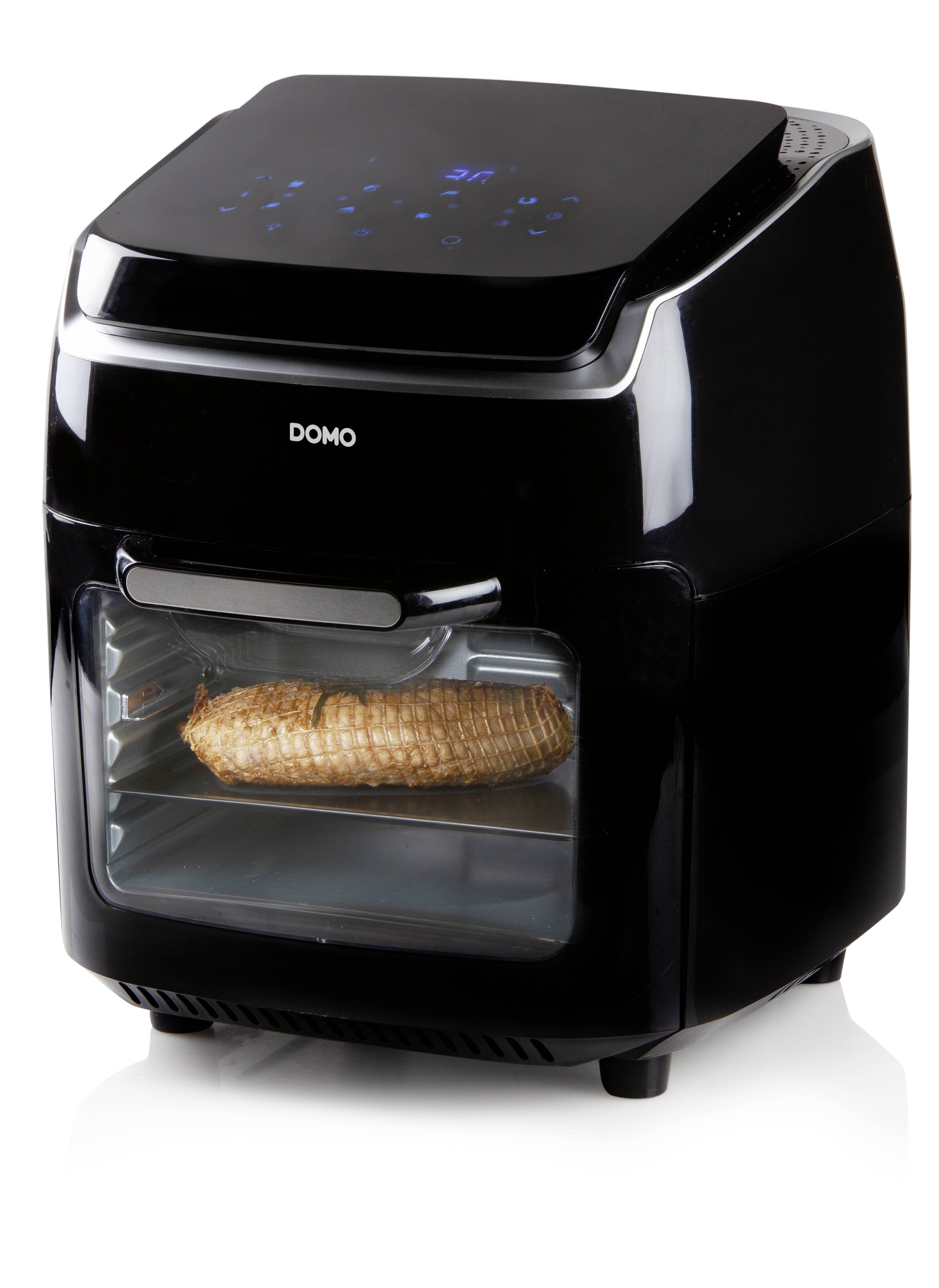 Zwarte heteluchtoven met digitaal display, toont brood binnenin tijdens het bakken. Hoofdfunctie: heteluchtfriteuren.