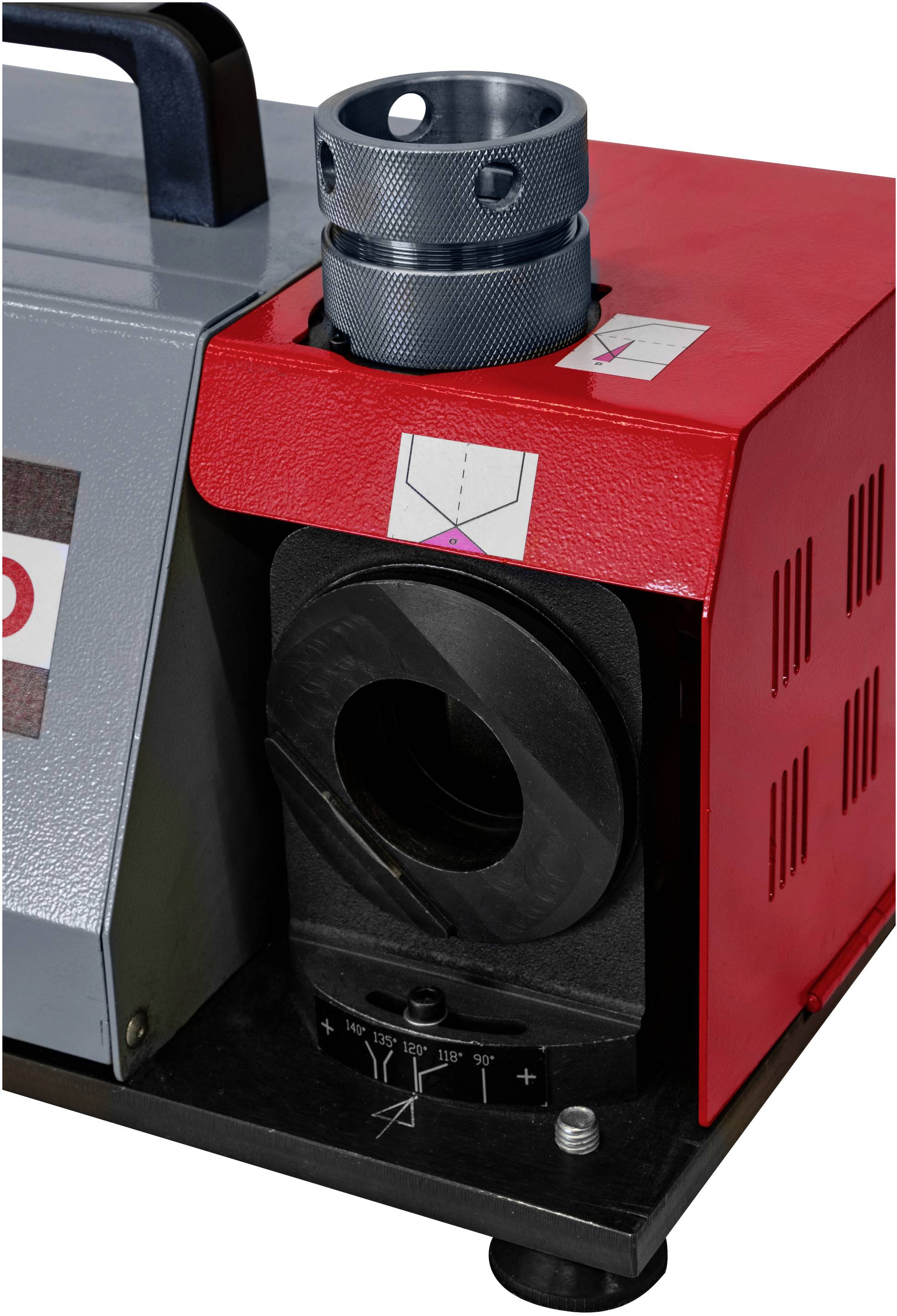 Machine met een rood en grijs behuizing, een zwart instelwiel en een zilveren cilinder. Markeringen voor de gekalibreerde instelling.