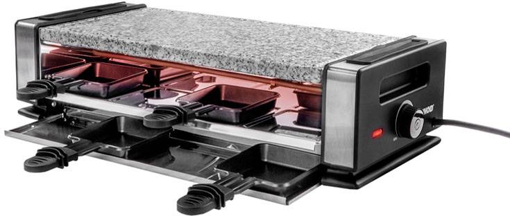Een raclette-grill met een natuurstenen plaat en meerdere pannetjes voor het bereiden van gerechten. Stroomadapter zichtbaar.