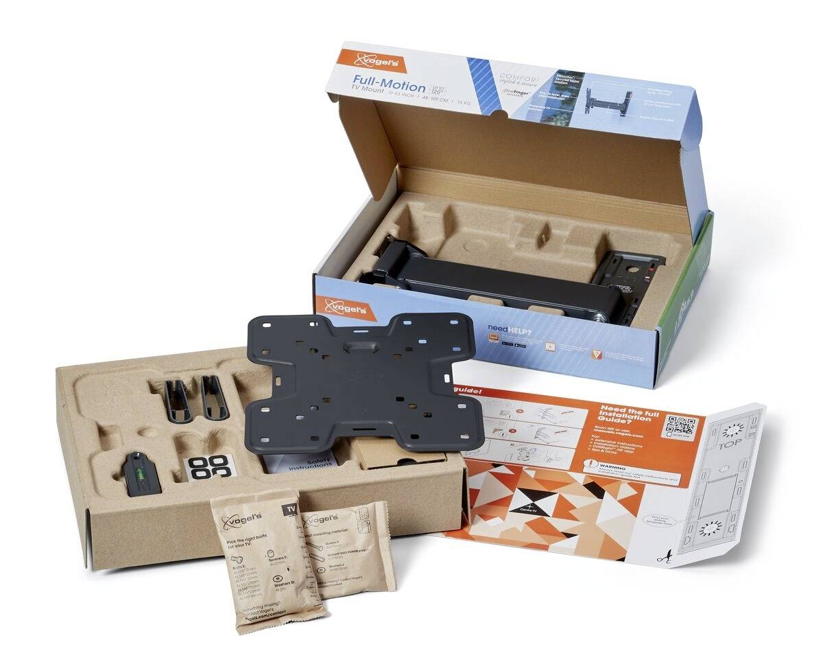'Vogels Wall-Mount' in geopende doos met accessoireonderdelen, montagehandleiding en accessoirepakket. Ideaal voor full-motion tv-beugels.