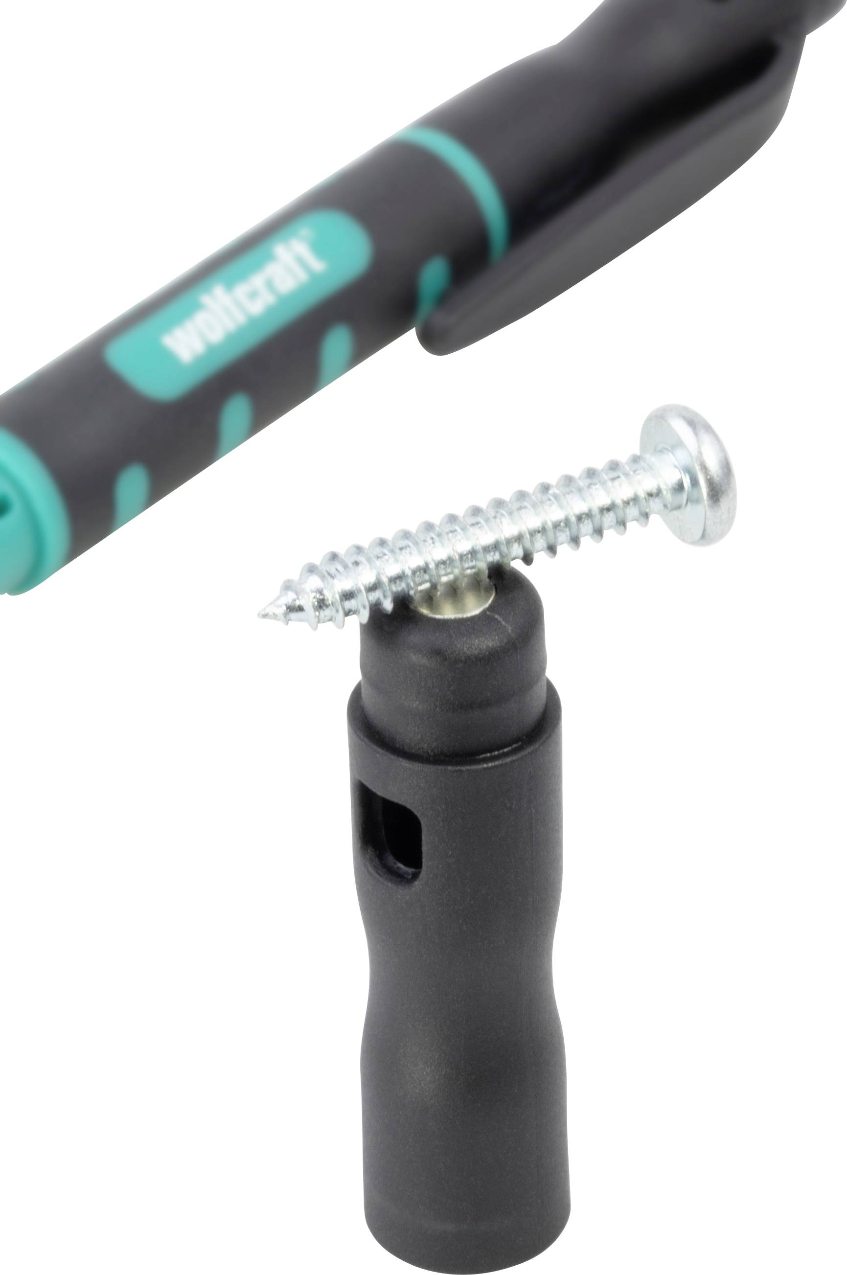 Close-up van een schroef die bevestigd is in een zwarte aanzet van een groen en zwart gereedschap.