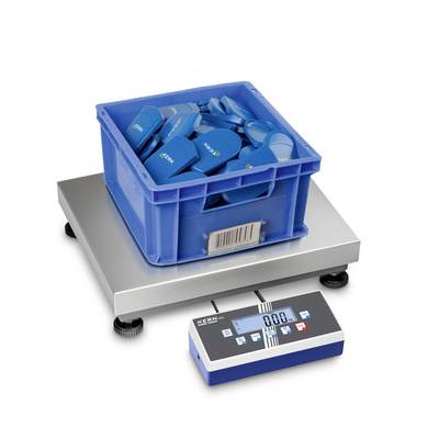 Een blauwe doos met verschillende blauwe voorwerpen staat op een digitale weegschaal. De display toont 0,00.