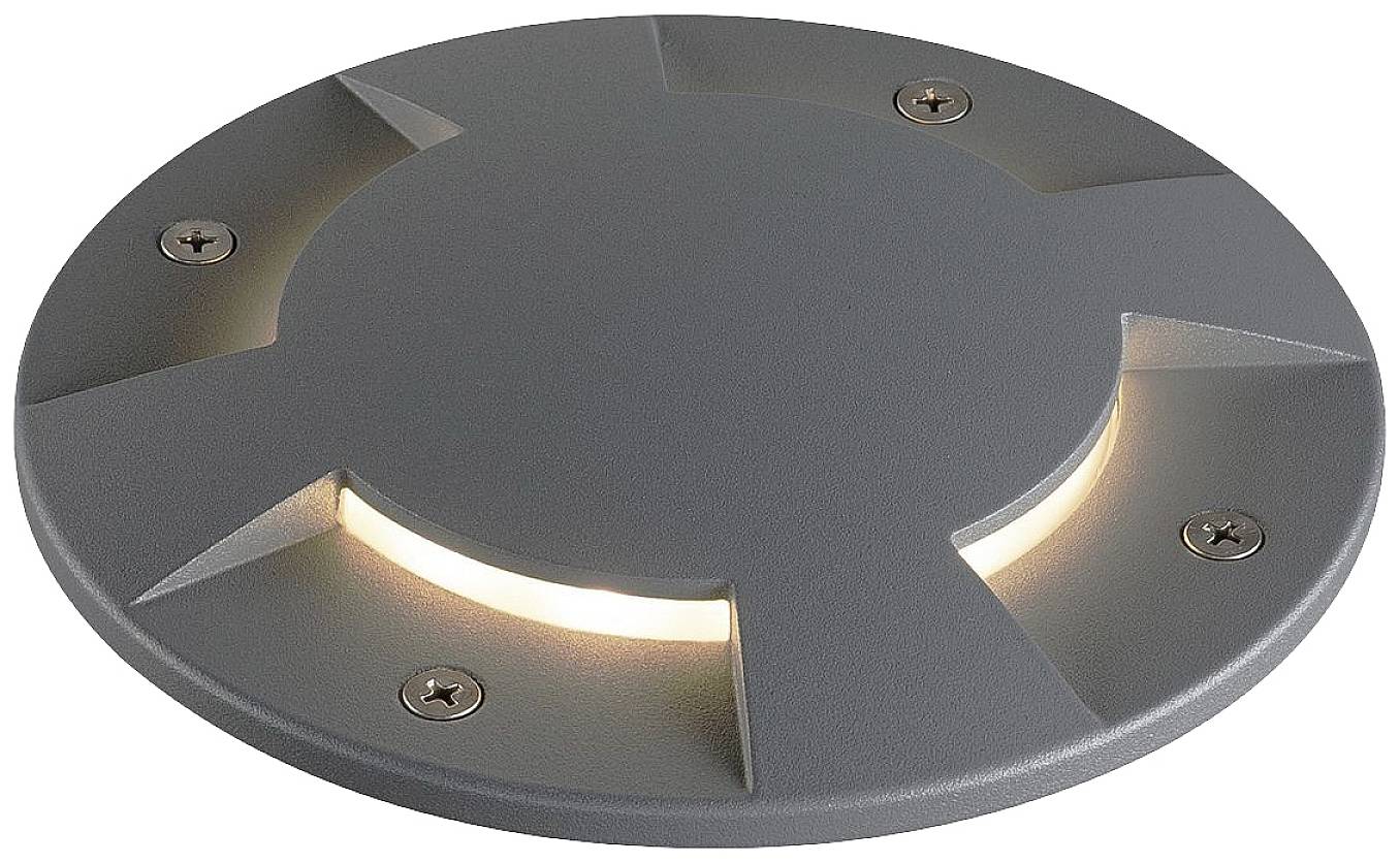 Ronde grondverlichting met vier lichtopeningen en zichtbare schroeven, geschikt voor buitengebruik. Verlicht oppervlakken gelijkmatig.