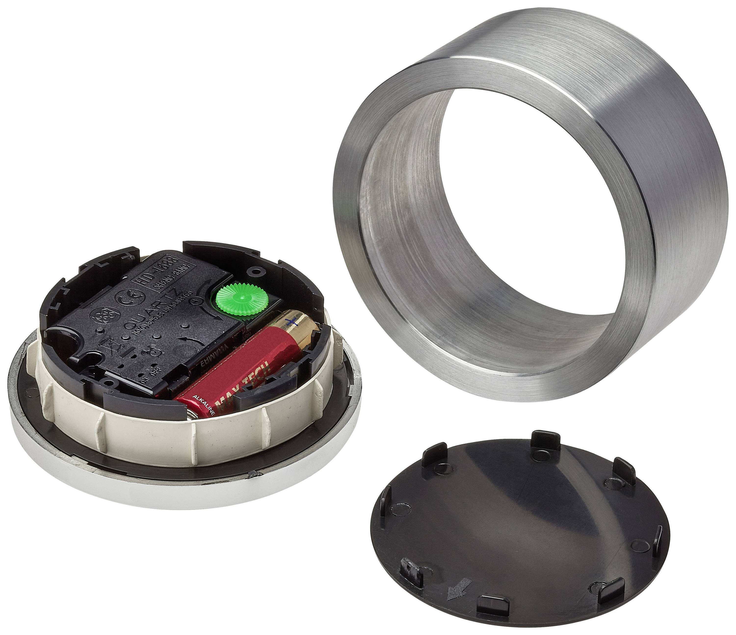 Metalen cilinder met verwijderbare deksel. Aan de binnenkant is een batterij en elektronica zichtbaar, vermoedelijk onderdeel van een technisch apparaat.