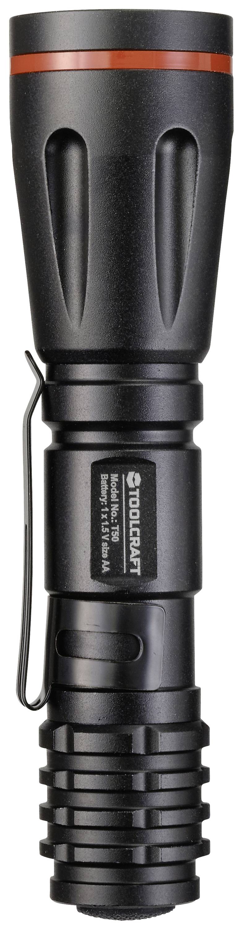 Zaklamp in het zwart met rode ring, zijclip en fabrikantslogo. Afgerond oppervlak met geprofileerd handgreepgedeelte.