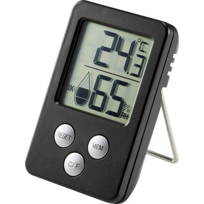 Een digitale thermo-hygrometer toont 24,3 graden Celsius en 65% relatieve luchtvochtigheid. Geplaatst op standaard.