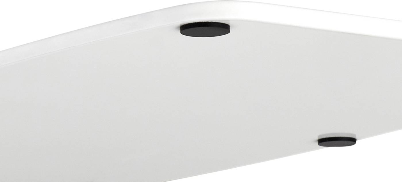 De onderste hoek van een witte tafel met drie zwarte, ronde viltglijders die beschermen tegen krassen op de vloer.