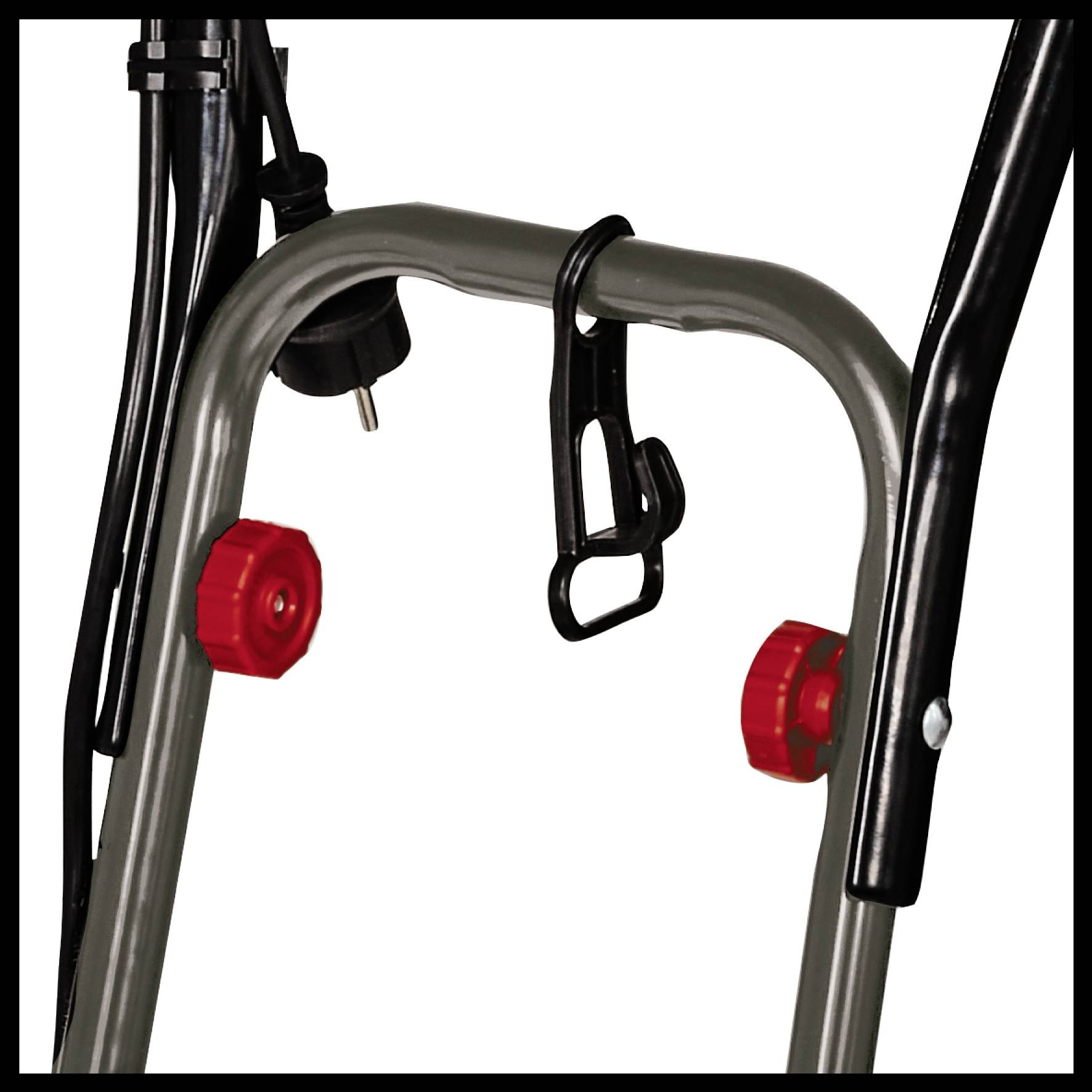 Een fragment van een metalen frame met rode knoppen en zwarte handgrepen. Een zwarte haak hangt aan de bovenste balk.