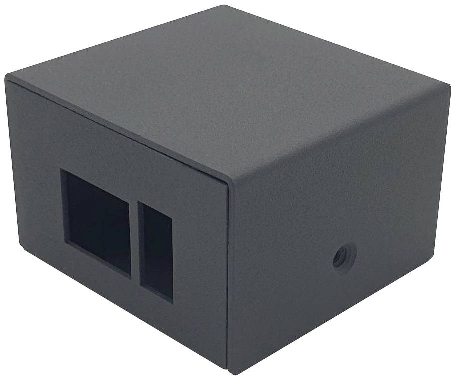 Zwart, rechthoekig kunststof behuizing met twee rechthoekige uitsparingen aan één zijde en een ronde opening aan een andere zijde.