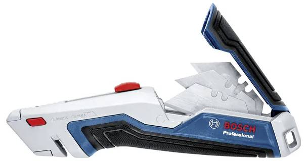 Een compacte utilitymes met een intrekbaar lemensysteem en een greephandvat. Het heeft een blauw, wit en zwart kleurenschema met een rode knop.