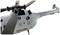 Speelgoed-helikopter met vier rotorbladen en opschrift 'AFX-105 Scale Helicopter'. Kanonnen en gedetailleerde structuur zichtbaar op de romp.
