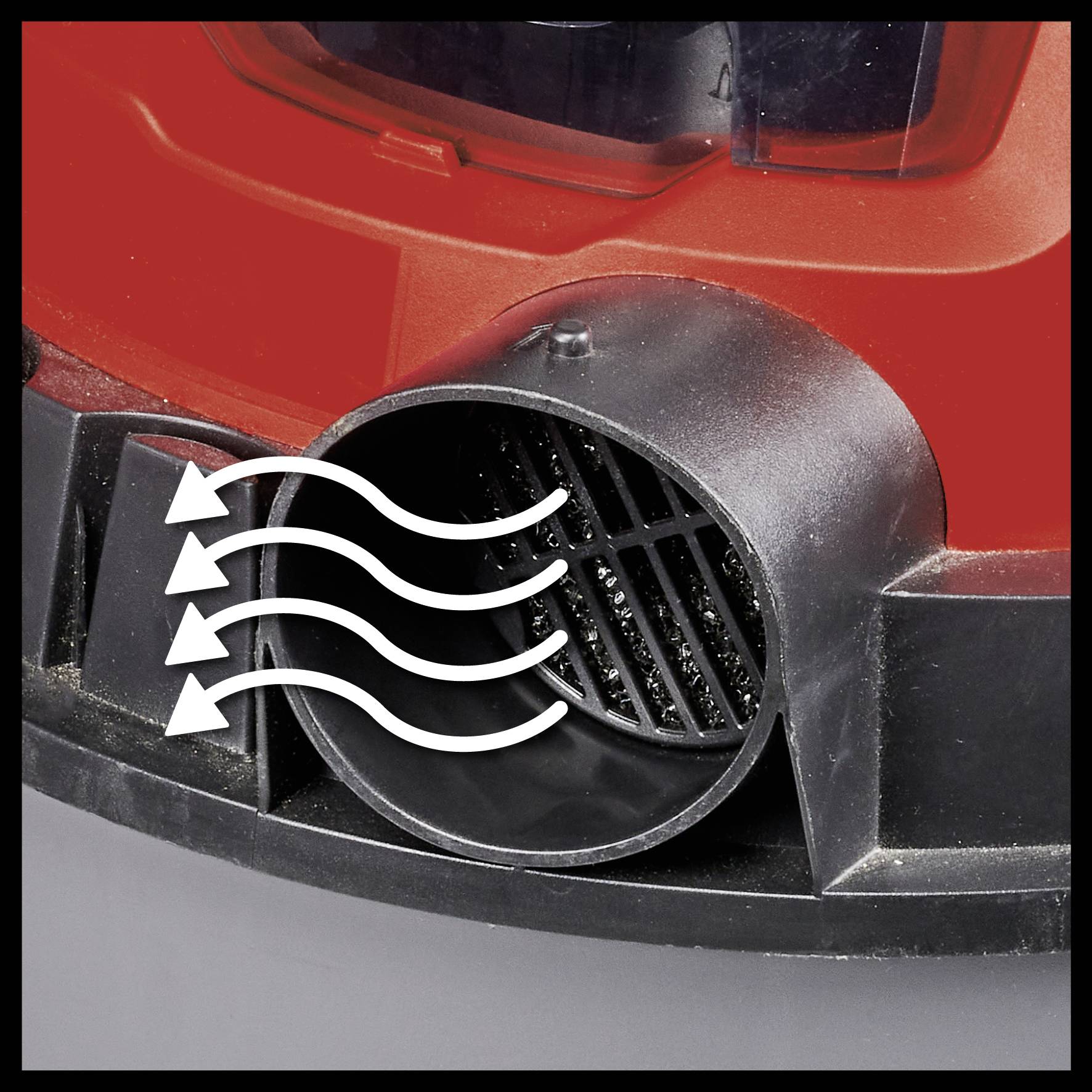 Luchtstroompijlen wijzen van een rond ventilatierooster op een stofzuiger af, wat de luchtstroom aangeeft.