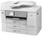 Een multifunctionele printer met drie papierladen en een digitaal display aan de voorkant.
