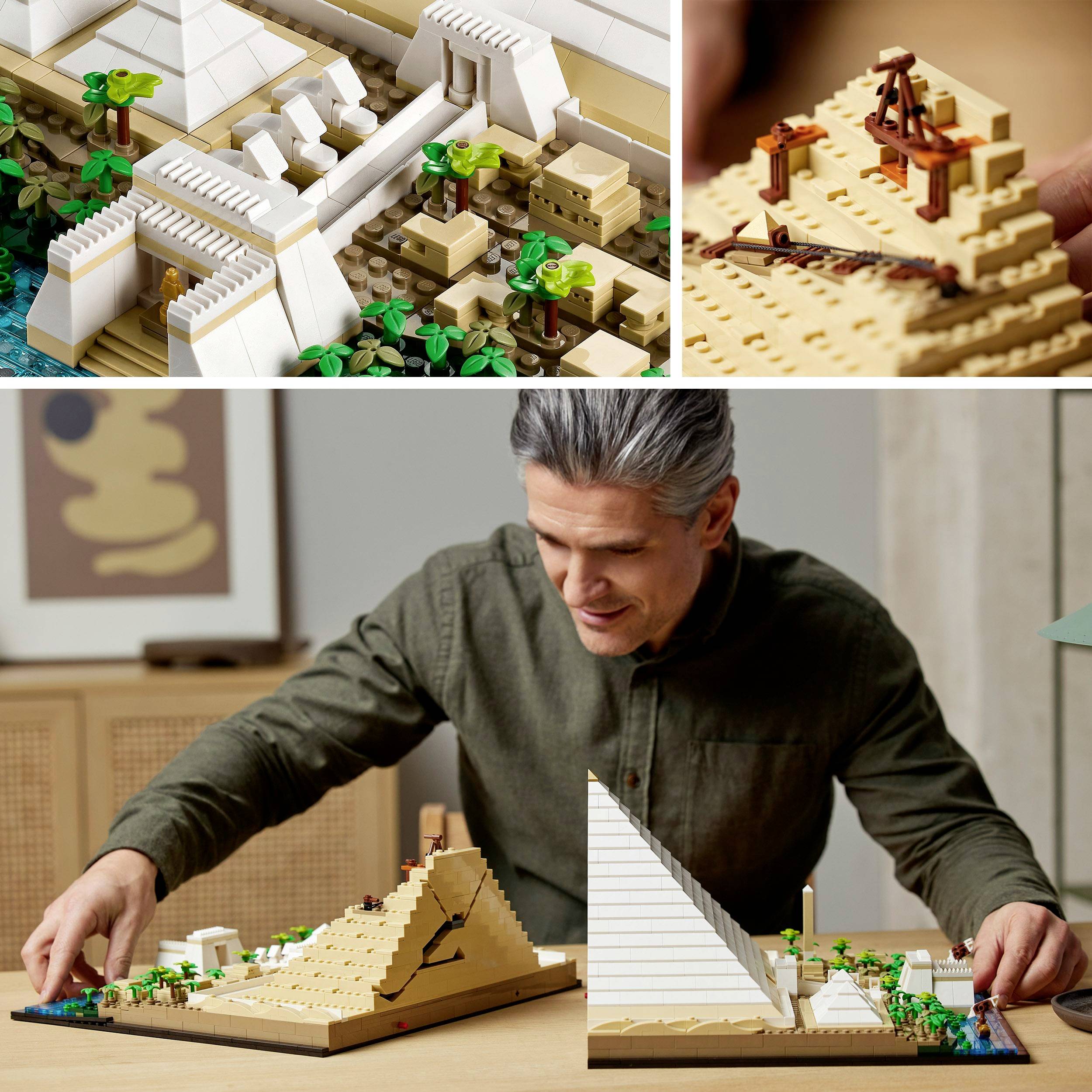 Een man zit aan een tafel en bouwt piramidemodellen van Lego-stenen, omringd door andere onderdelen en verborgen decoratie.
