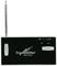 Zwarte functietransmitter met antenne, schakelaar en indicatielampjes voor 'Power' en 'Charge'. Opschrift: 'Transmitter high sensitive'.