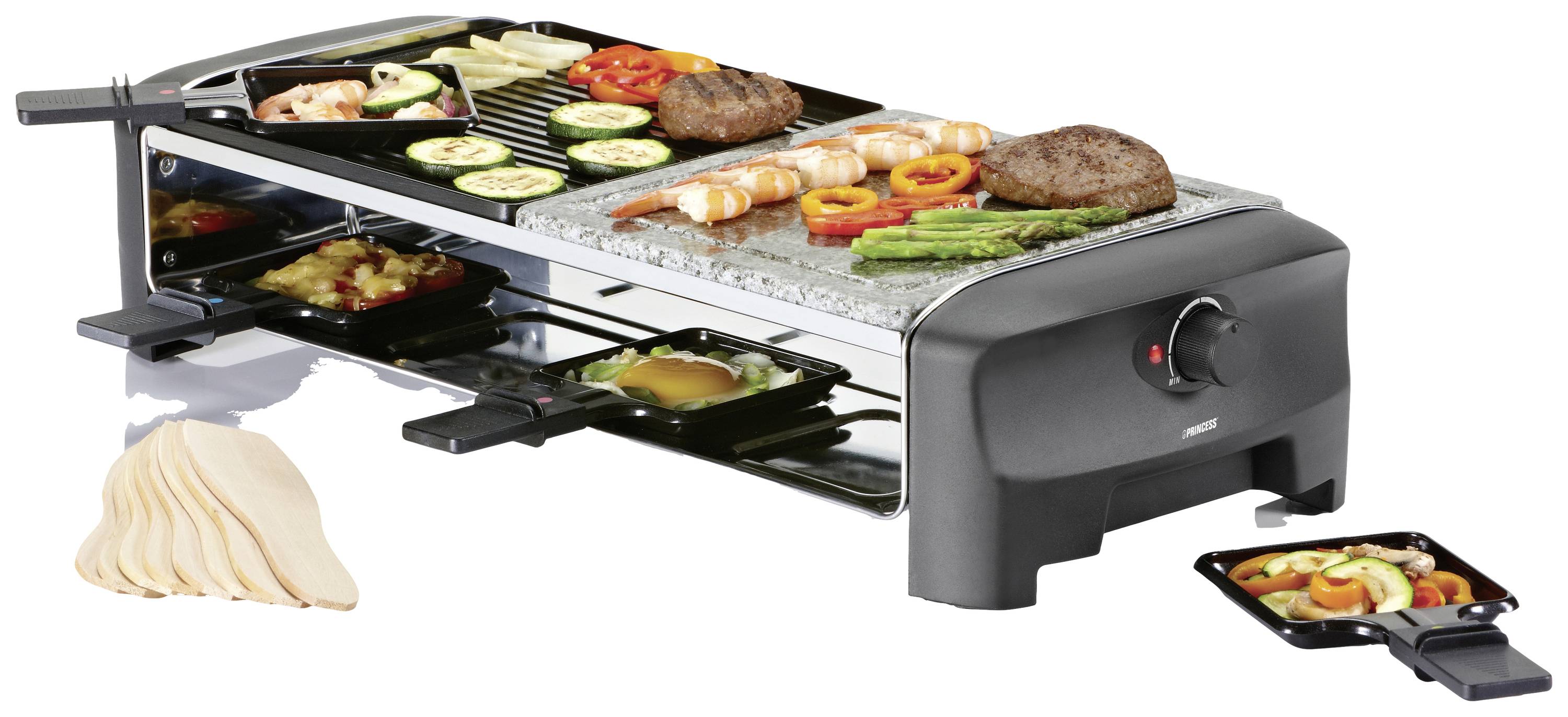 Een elektrische tafelgrill met raclette-functie toont gegrilde groenten, vlees en zeevruchten op de grillplaat, waarbij de schaaltjes eronder gevuld zijn.