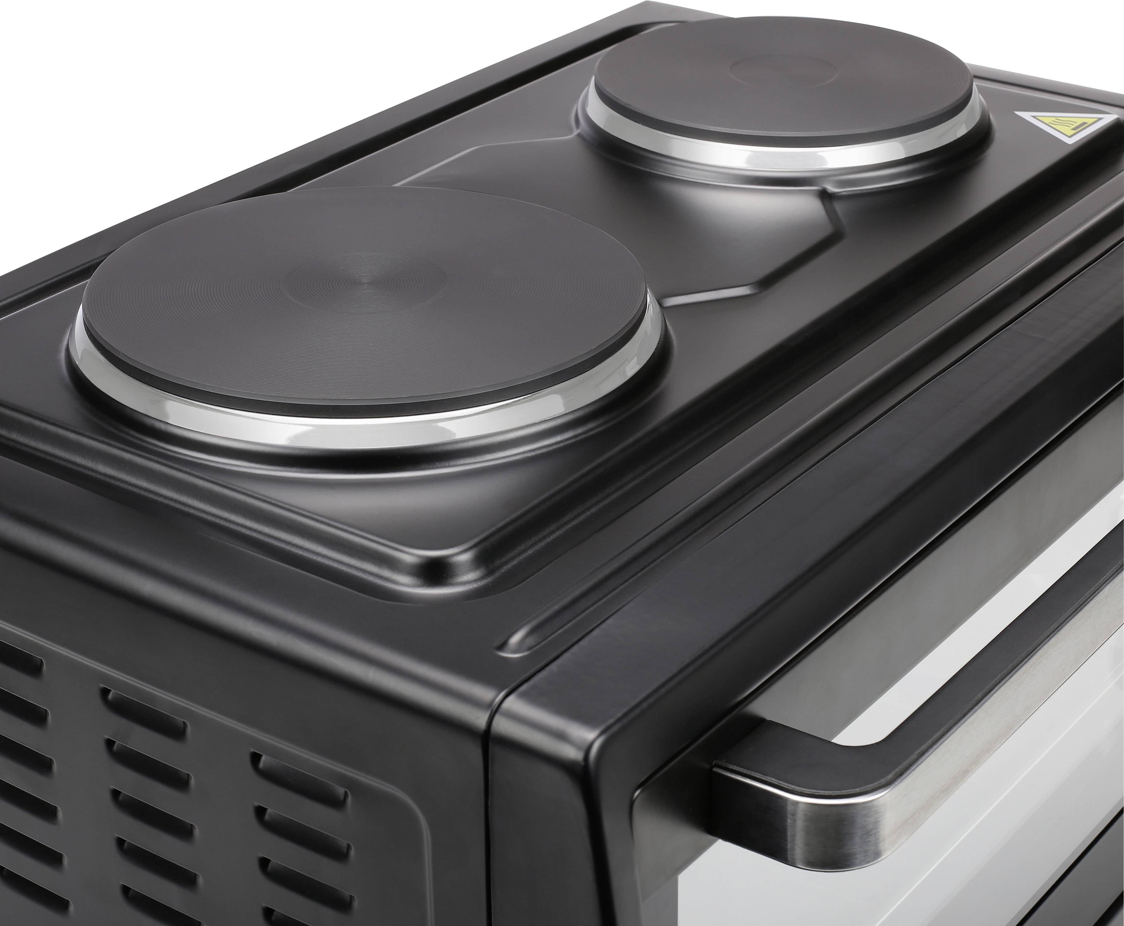 Compacte zwarte mini-oven met dubbele kookplaat bovenop, ideaal voor kleine keukens of studentenkamers.