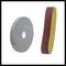 'Grinding disc and grinding belt for grinding machines, gray and rust-brown, positioned side by side on a white background.'