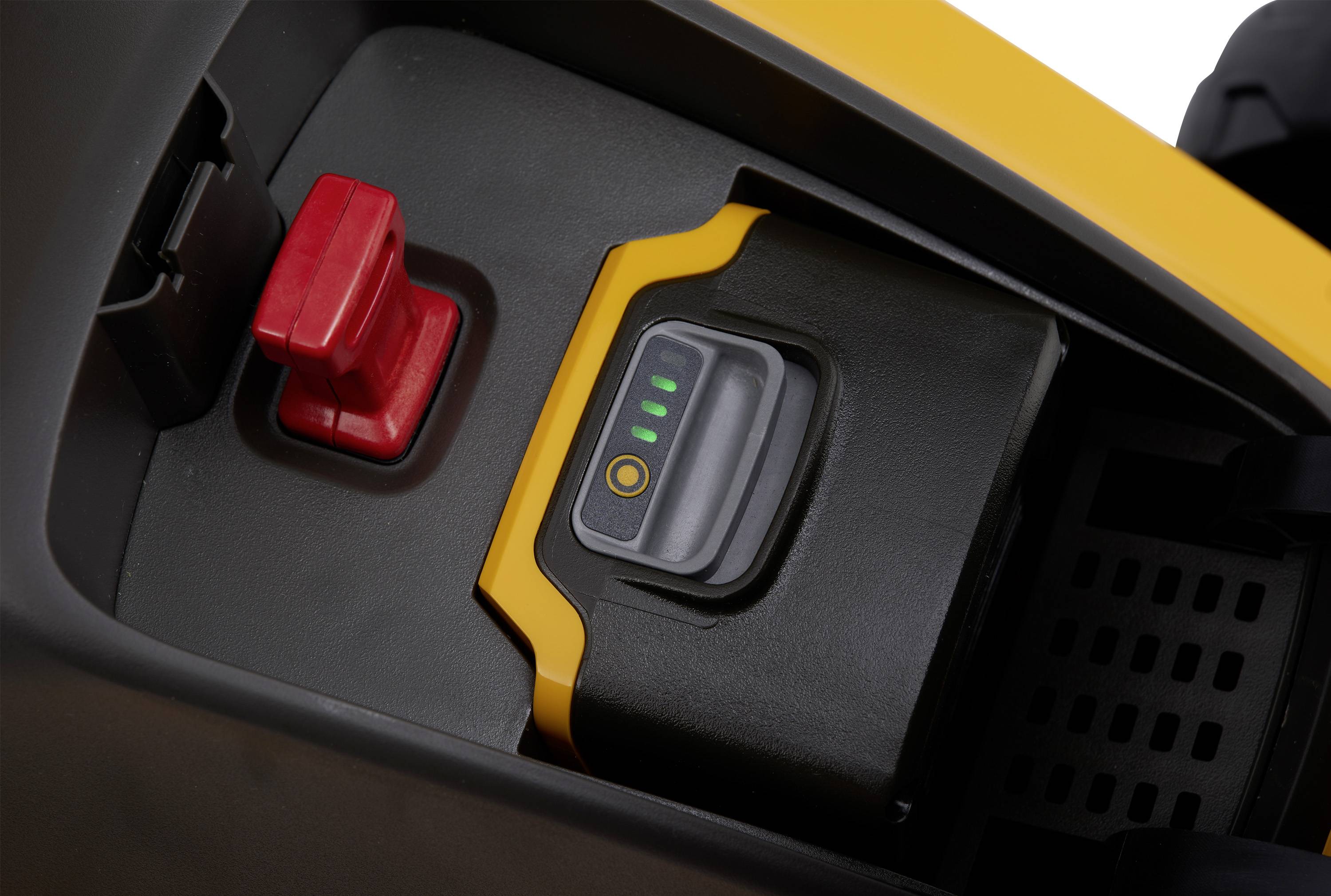 'Batterijvak met oplaadsymbool en vier groene LED's op een apparaat. Ernaast bevindt zich een rode hendel.'