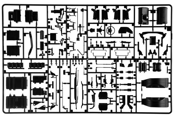 Een modelbouwpakket met verschillende kunststof onderdelen, nauwkeurig gerangschikt om een voertuig of model in elkaar te zetten.