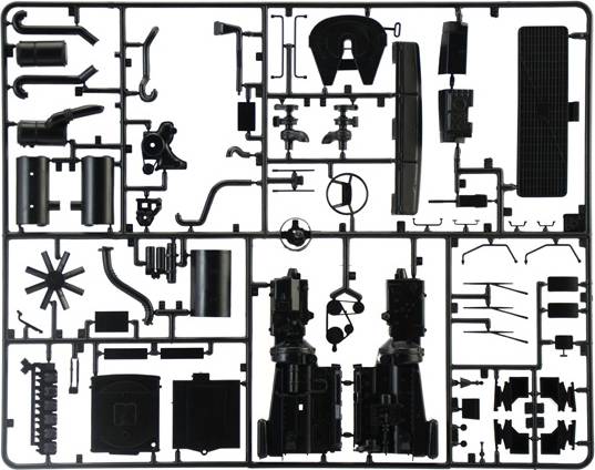 Plastic modelbouwpakket met verschillende onderdelen voor assemblage. Bevat buizen, banden, behuizingen en andere componenten.