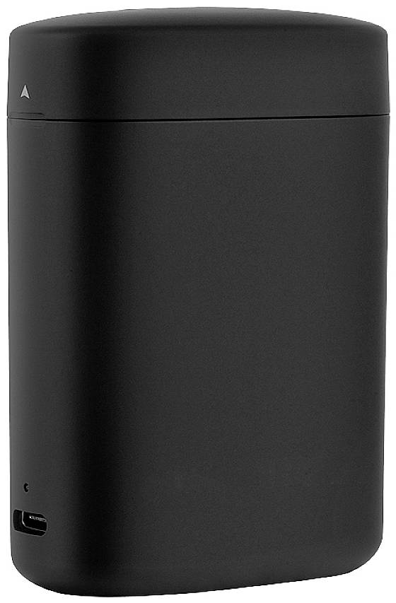 Zwart, cilindrisch apparaat met afgeronde randen, mogelijk een elektronisch product met een USB-poort aan de zijkant.