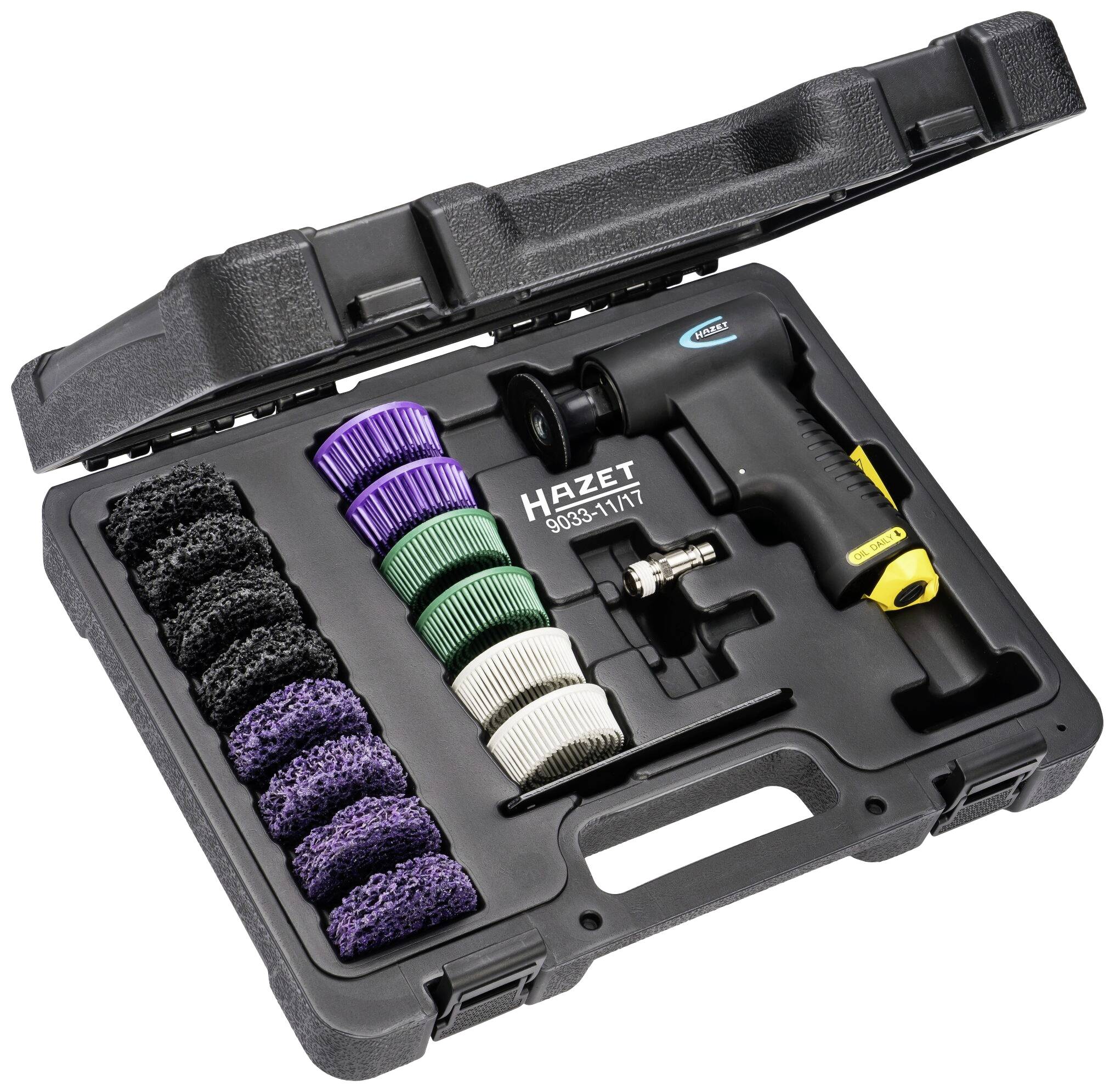 Geopende gereedschapskoffer met een pneumatische haakse slijper, verschillende slijpschijven in diverse kleuren en bijpassende accessoires.