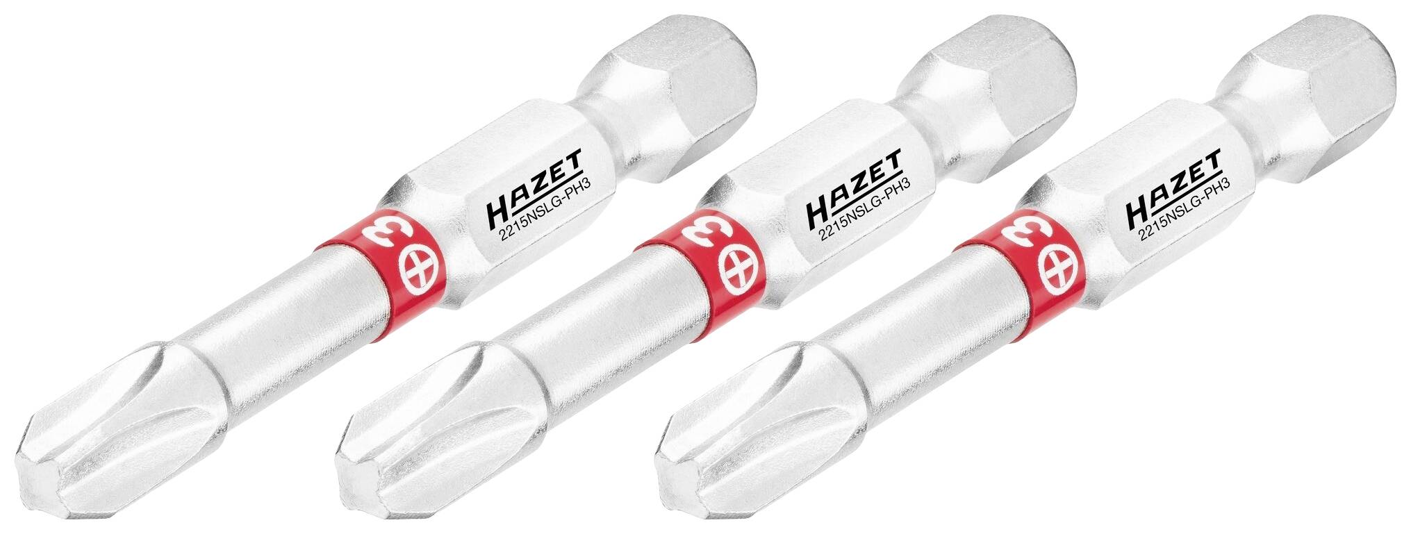 Drie zilveren schroevendraaier-bits met een rode ring en 'Hazet' opschrift, naast elkaar liggend, geschikt voor kruiskopschroeven.