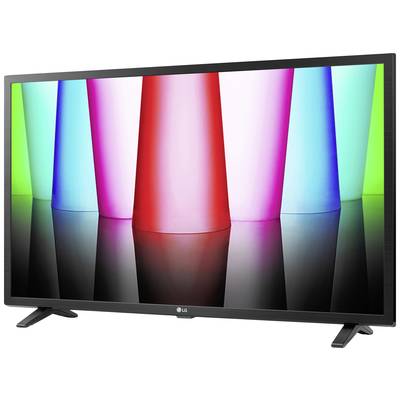 Flatscreen-televisie met kleurrijk display licht op en toont abstracte gekleurde balken in een donkere ruimte.