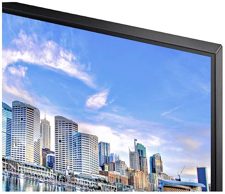 Moderne wolkenkrabbers voor een blauwe hemel met enkele wolken, met water en een havenstructuur op de voorgrond.