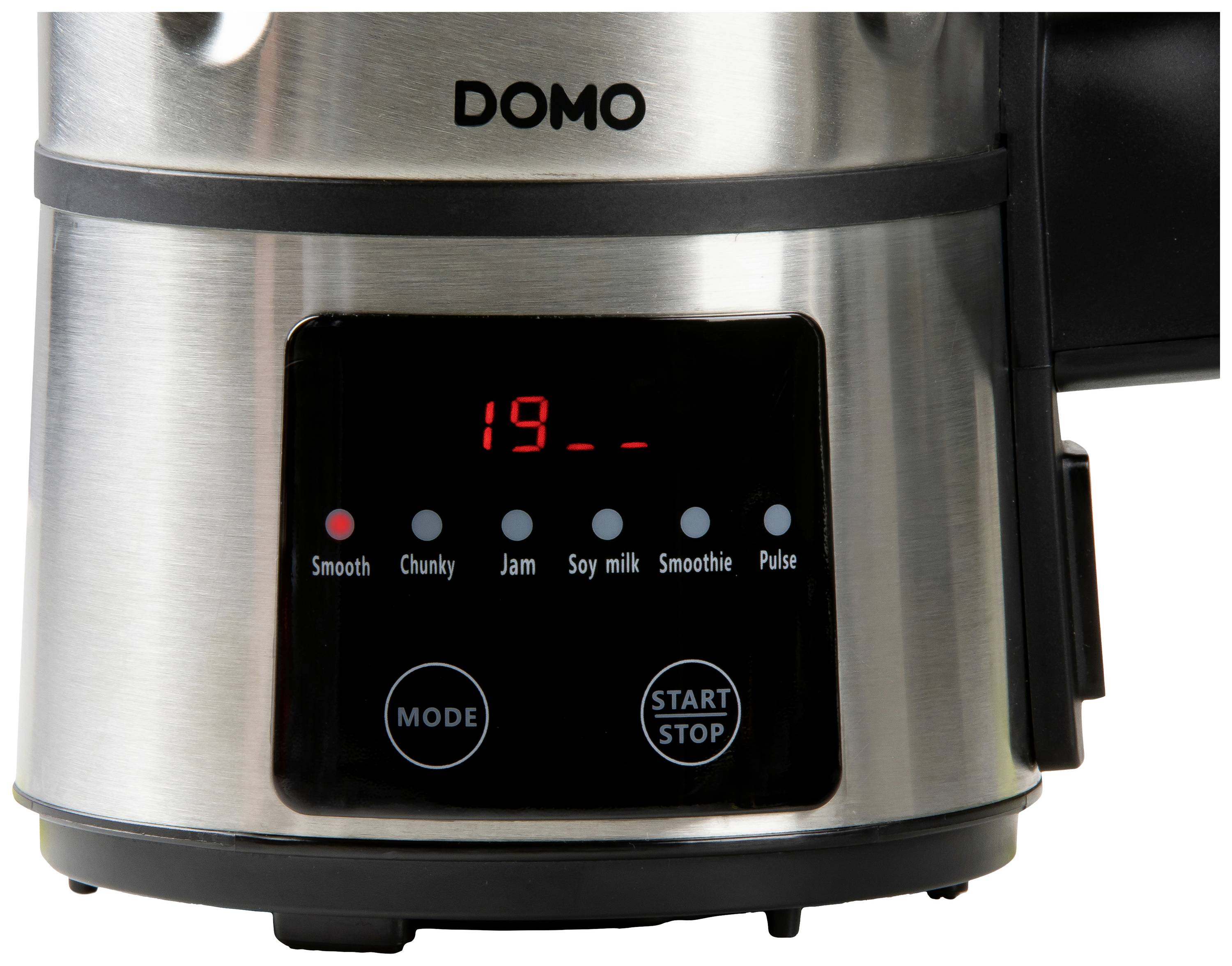 Zilveren keukenmixer met digitaal display waarop '19' wordt weergegeven. Daaronder toetsen voor modi zoals 'Glad', 'Grof', 'Jam', 'Sojadrank', 'Smoothie', 'Pulse'.