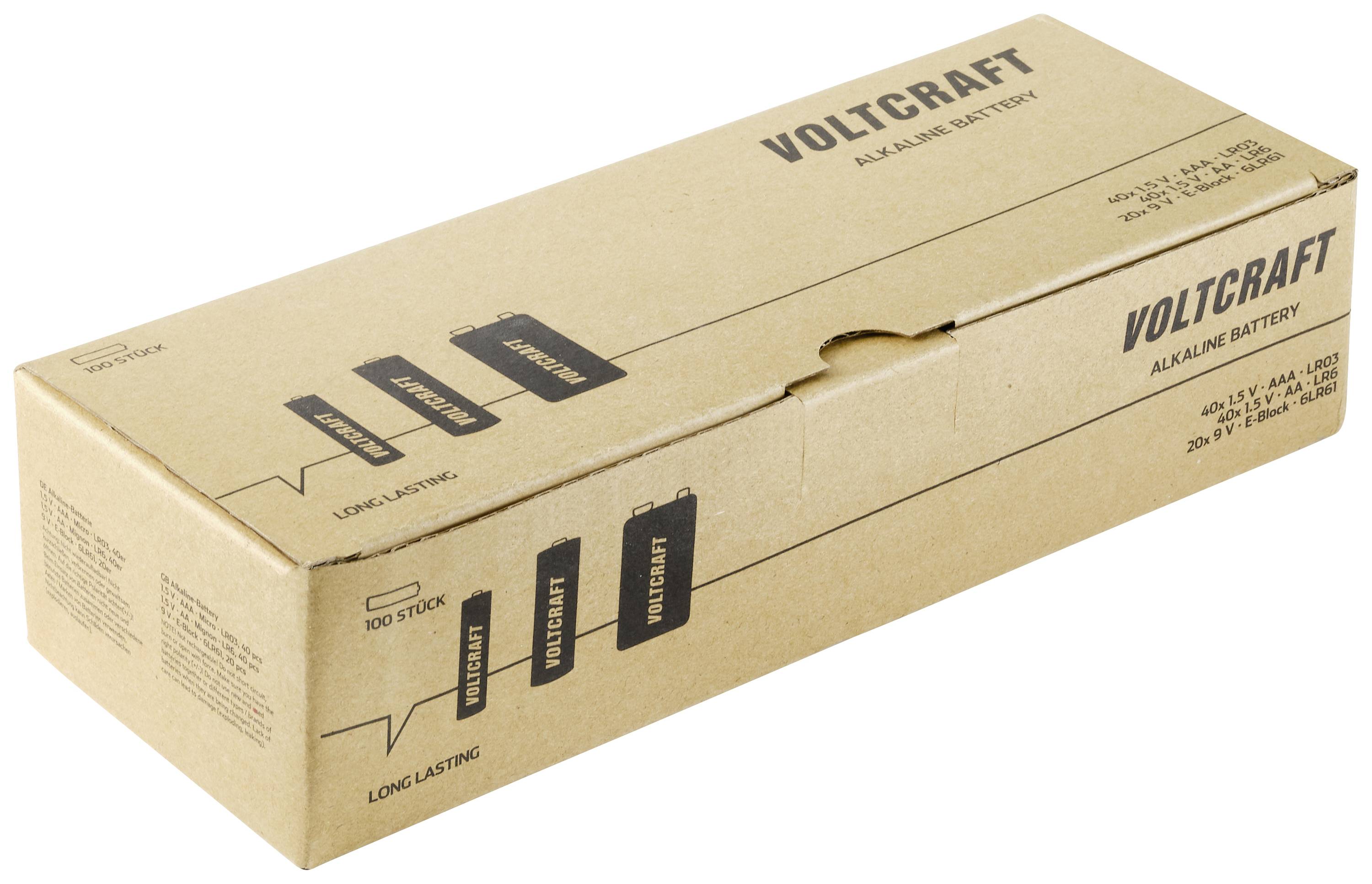 Een bruine kartonnen doos met de opdruk 'Voltcraft' en 'Alkaline Battery'. Toont productdetails en symbolen voor langere houdbaarheid.