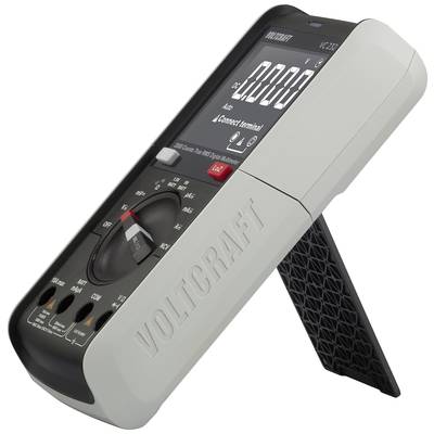 Digitale multimeter met 'Voltcraft' opdruk op de behuizing, ingebouwde standaard, groot display, draaiknop voor moduusselectie, meetaansluitingen onderaan.
