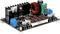 Elektronische schakeling met digitale weergave, spoelen, condensatoren en potentiometers op een printplaat, gebruikt voor spanningsregeling.