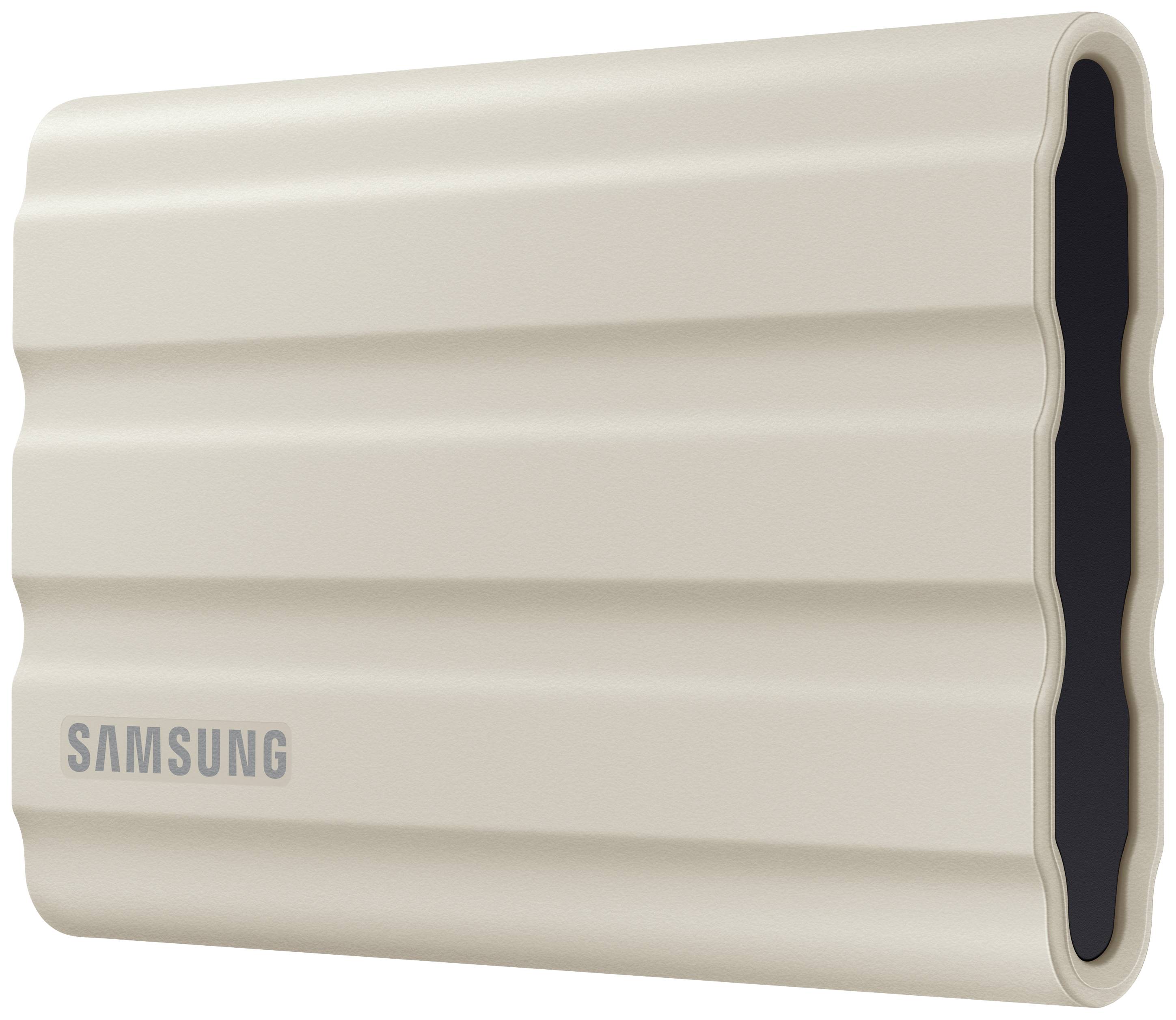 Externe beige Samsung-harde schijf met gestructureerd design. Ideaal voor gegevensback-up en -opslag. Compact, modern uiterlijk.