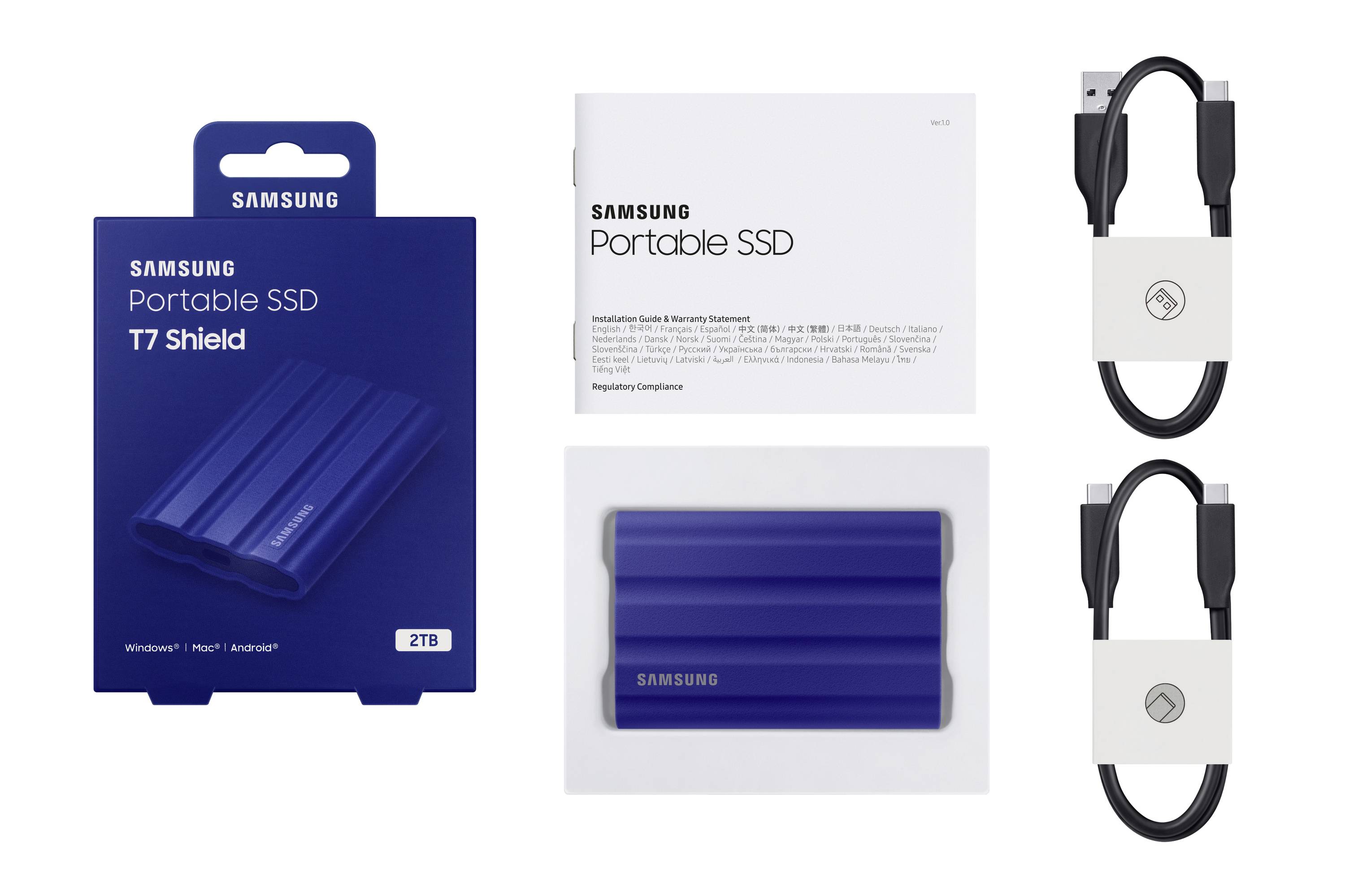 "Samsung Portable SSD T7 Shield, 2TB" met blauwe beschermhoes, handleiding en twee verbindings-/oplaadkabels. Voor snelle gegevensoverdracht.