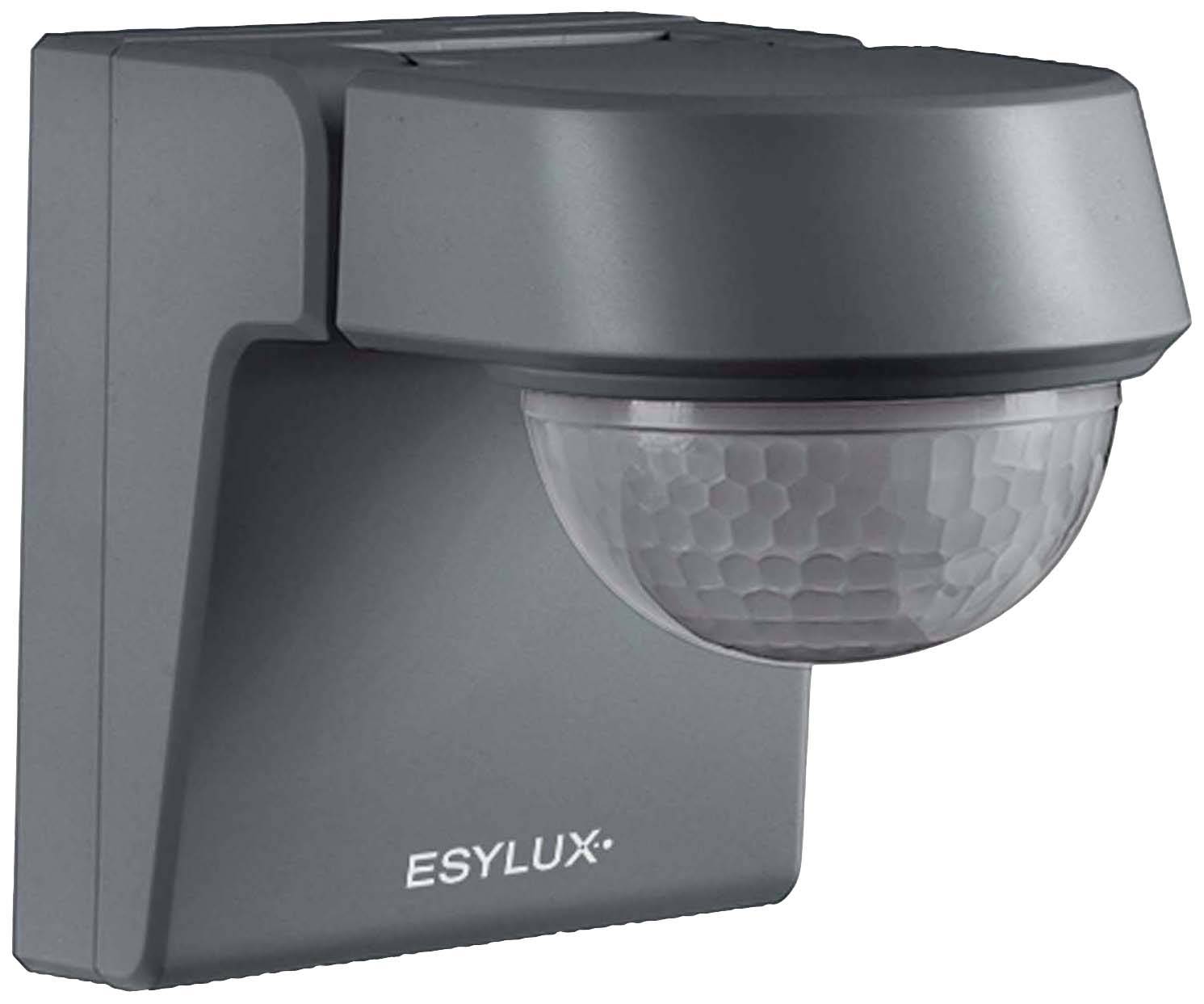 Bewegingsmelder in een grijs behuizing voor wandmontage, gemarkeerd met het 'ESYLUX' logo, hoofdzakelijk bedoeld voor het detecteren van bewegingen in de nabije omgeving.