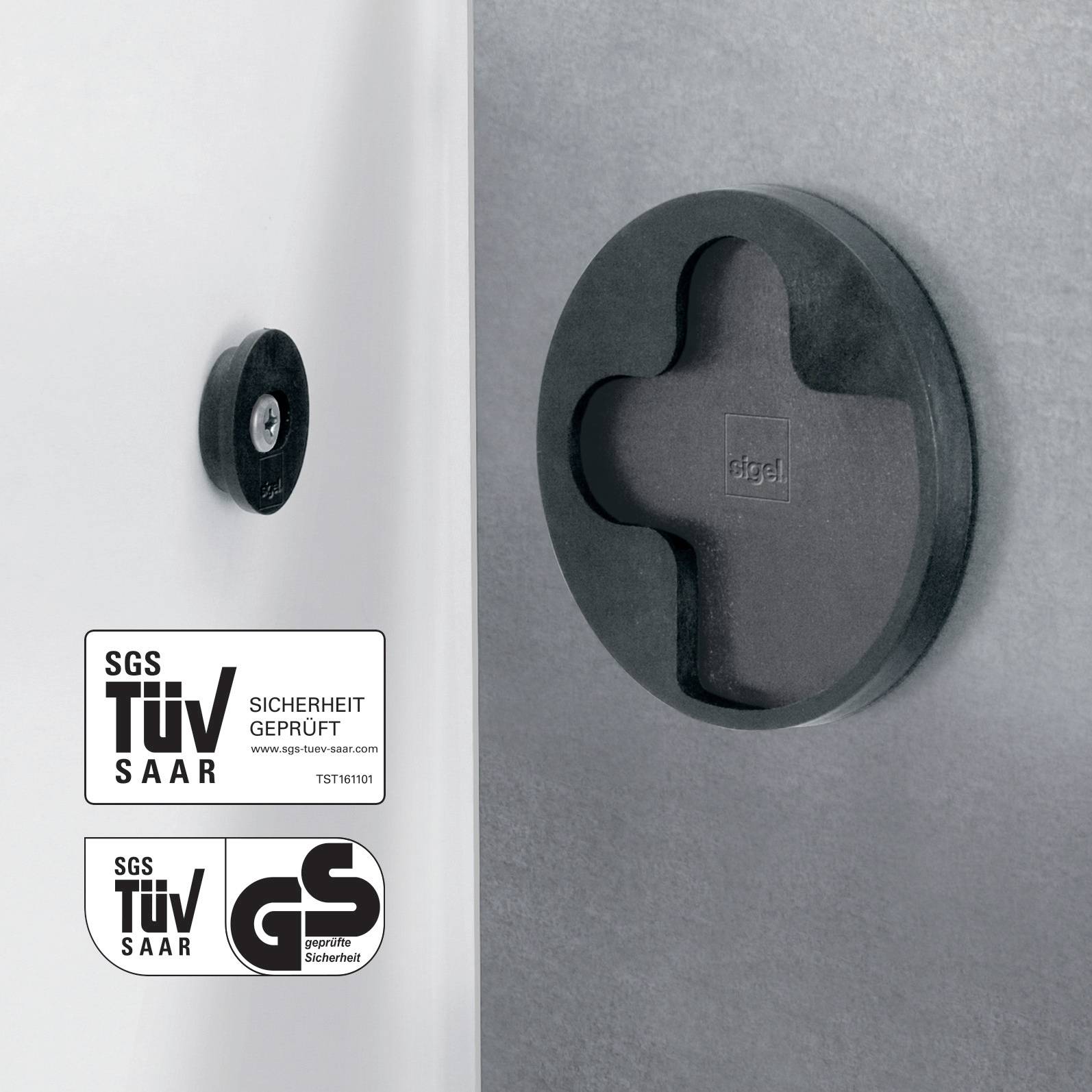 Ronde zwarte veiligheidsslot op zilveren metalen achtergrond; TÜV-certificaat linksonder.