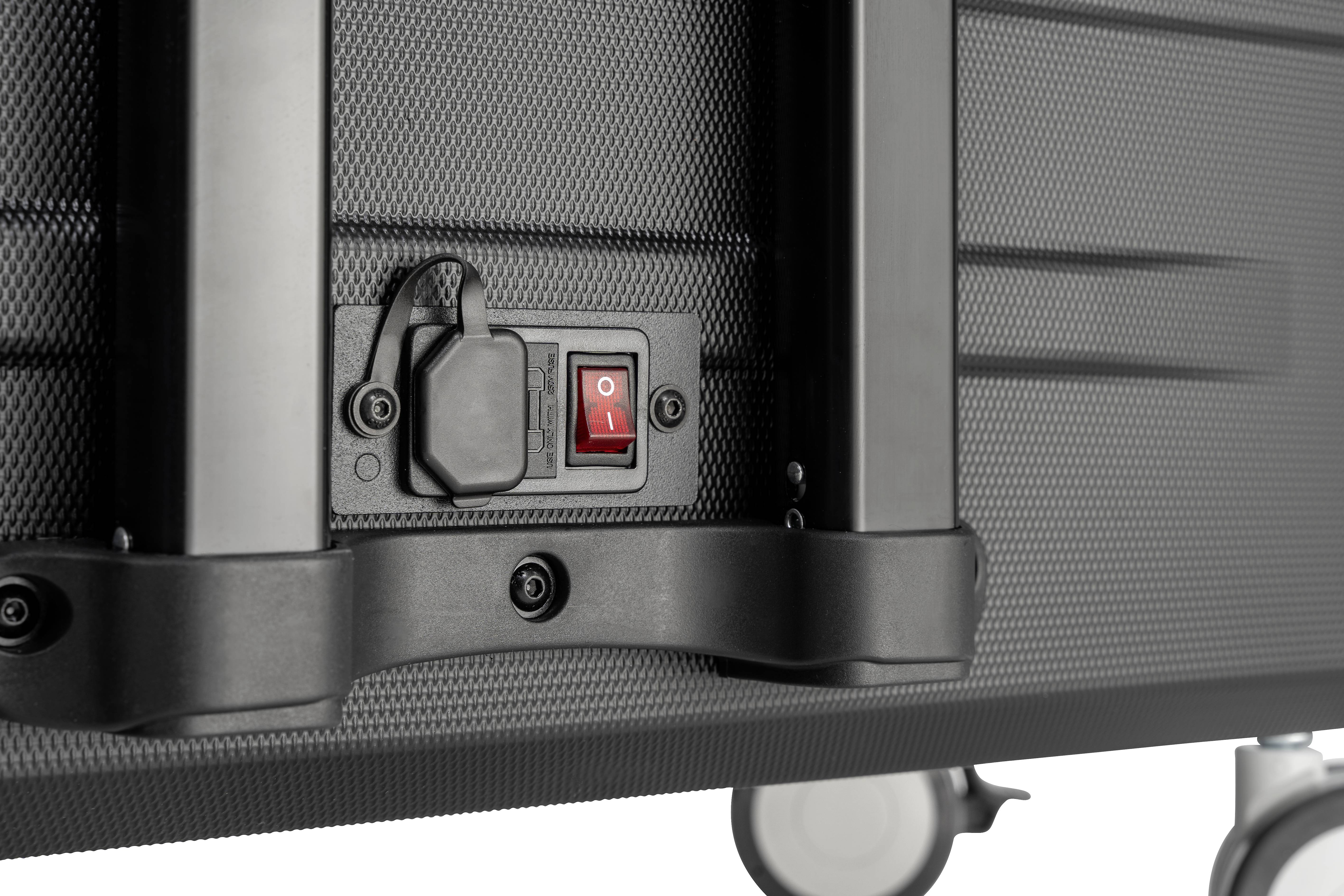 De schakelaar van de koffer staat in de 'Uit'-stand, omgeven door een kunststof frame. De koffer heeft een gestructureerde oppervlakte.