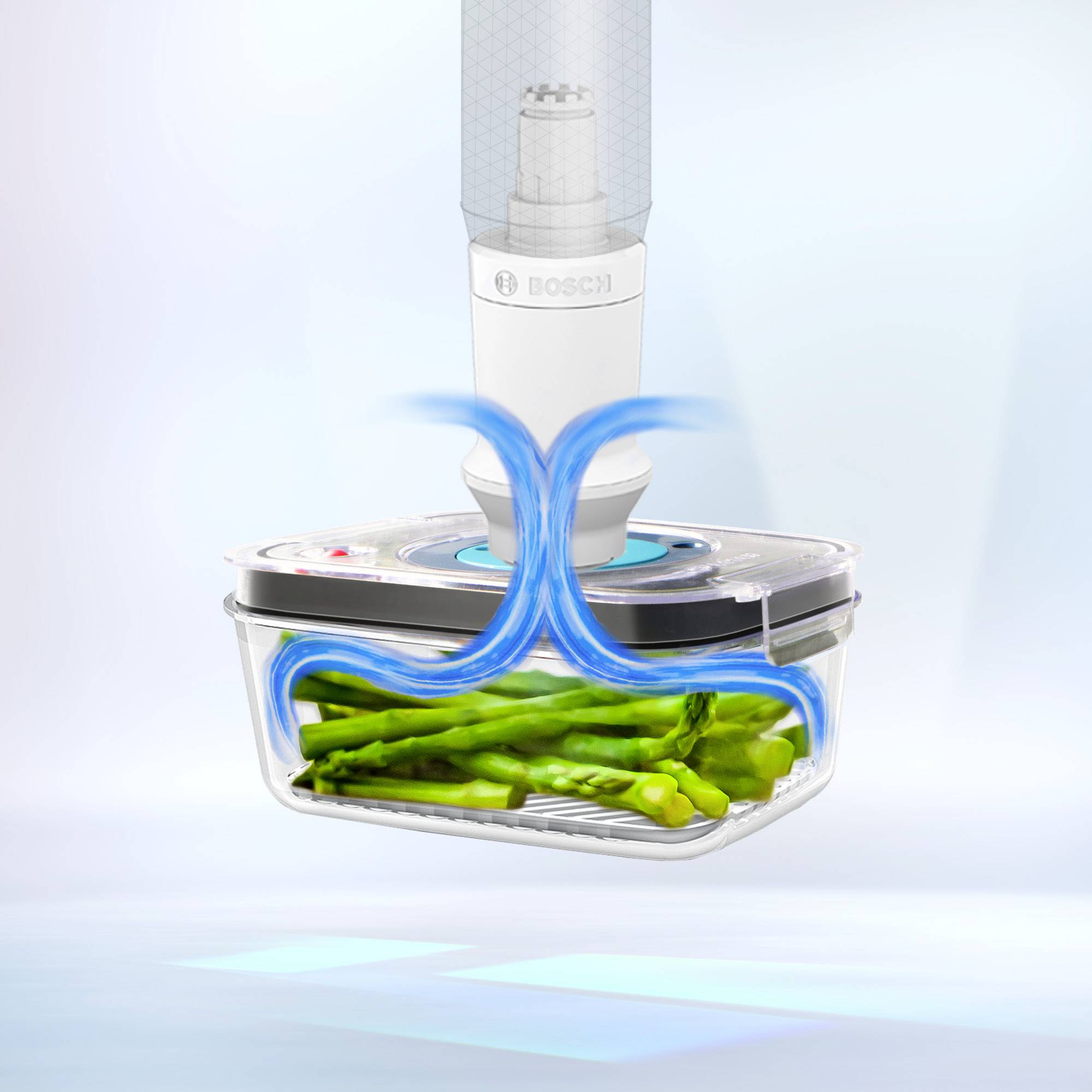 Een vacuümeermachine verzegelt een doos met groene asperges. De luchtstroom toont het vacuümproces.