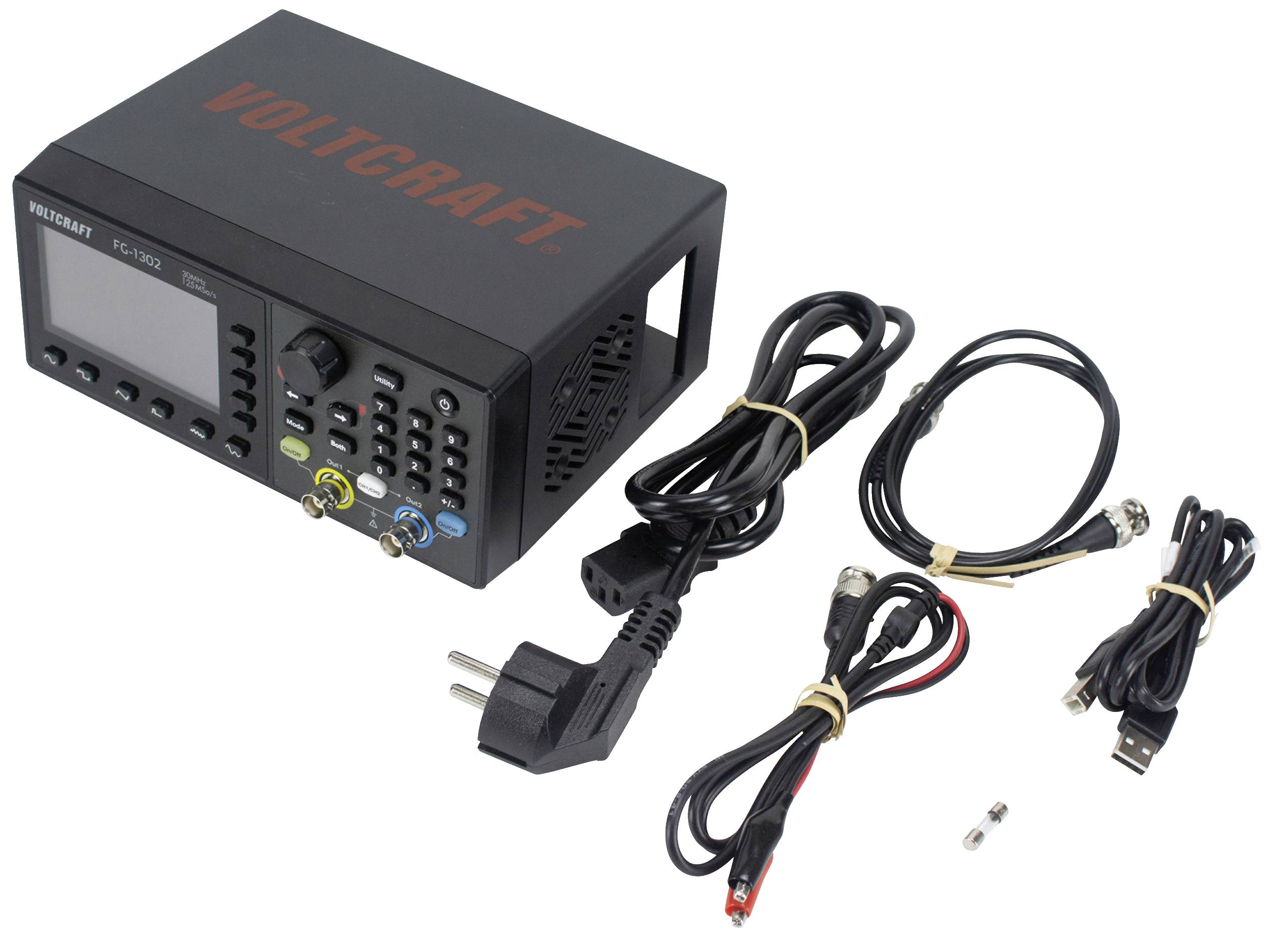 Voedingsapparaat met meerdere kabels en stekkers, merk Voltcraft. Geschikt voor stroomvoorziening en spanningsregeling van elektronische apparaten.