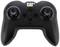 Een zwarte controller met twee joysticks, vier knoppen en het 'CAT'-logo bovenaan.