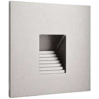 Metalen vierkante plaat met een gecentreerde rechthoekige uitsparing. Daarachter zijn kleine trapvormige structuren zichtbaar.