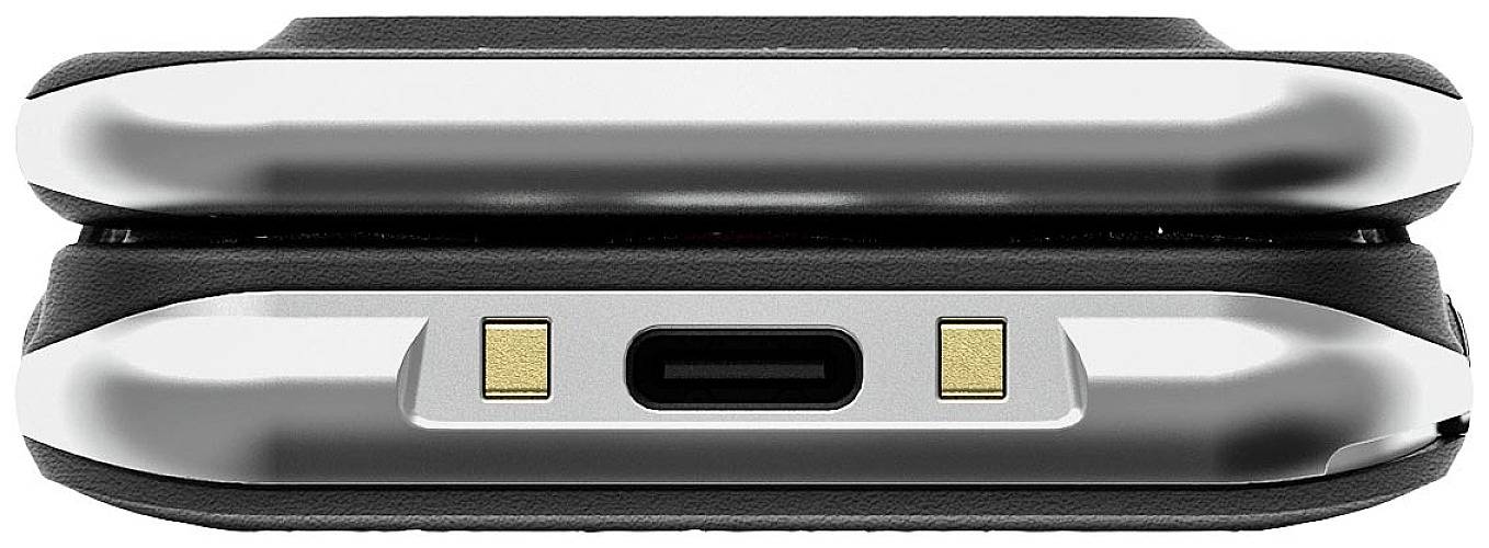 'Onderkant van een smartwatch met oplaadaansluiting en twee gouden contactpunten.'