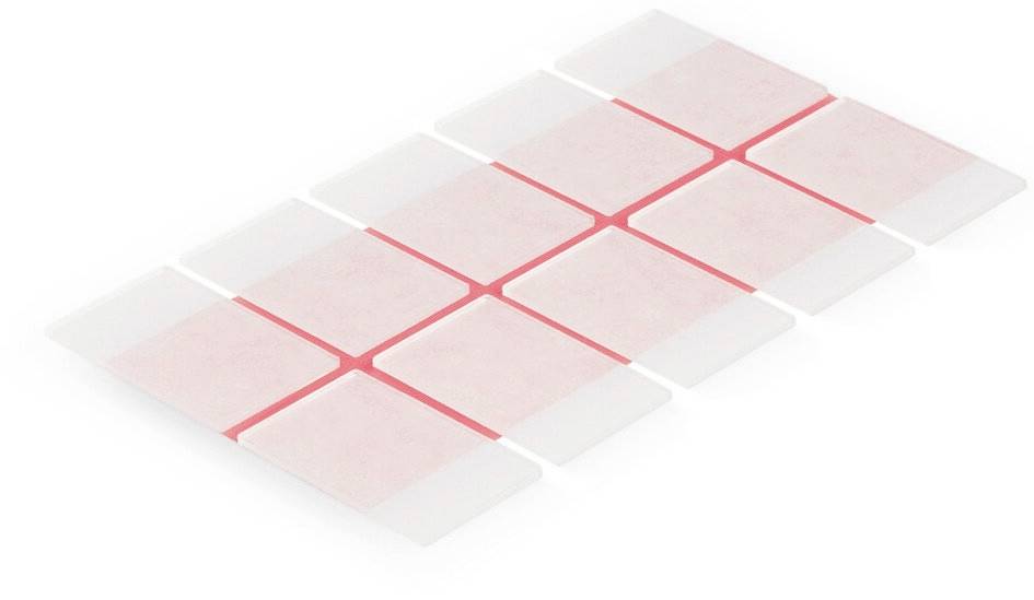 Plakpunten in twee rijen gerangschikt, vaak gebruikt voor lichte bevestigingsklussen aan oppervlakken of in knutselprojecten.