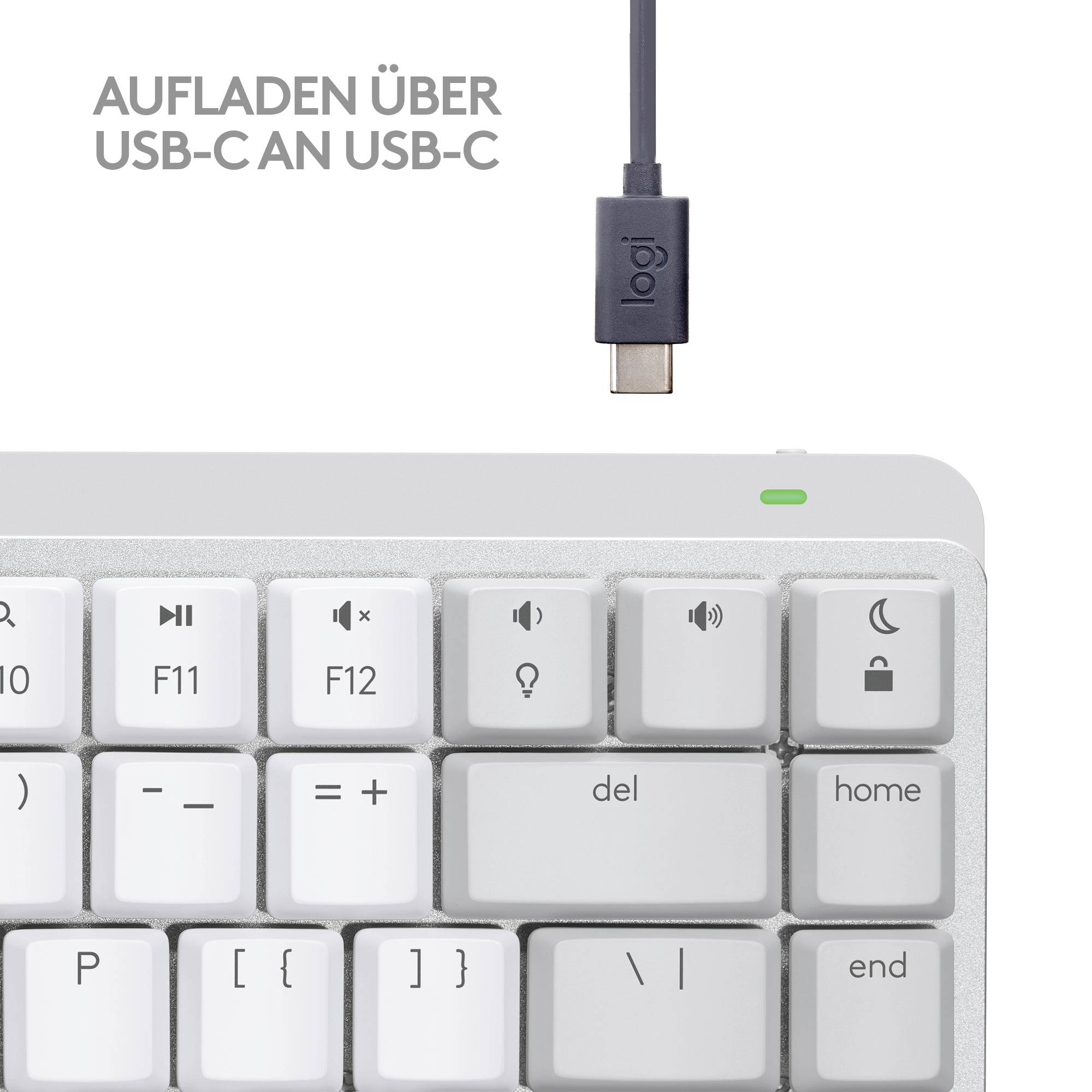 Toetsenbord met USB-C-oplaadkabel, tekst 'Opladen via USB-C naar USB-C' toont de oplaadaansluiting bovenaan.