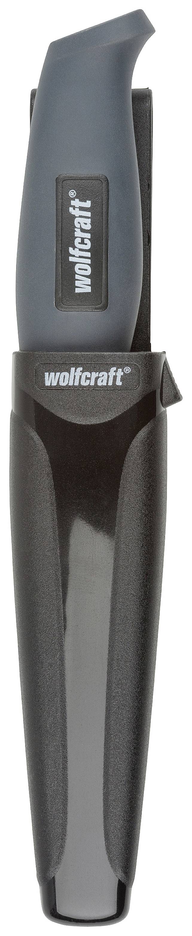 Een zwart en grijs opvouwmes van het merk 'wolfcraft', in de bijbehorende hoes. Het mes heeft een ergonomisch ontwerp.